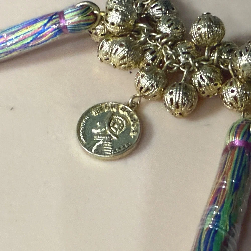 Gold Tone Boho Charm Bracelet with Coins‎ Tassels and Filigree Beads Multi Color